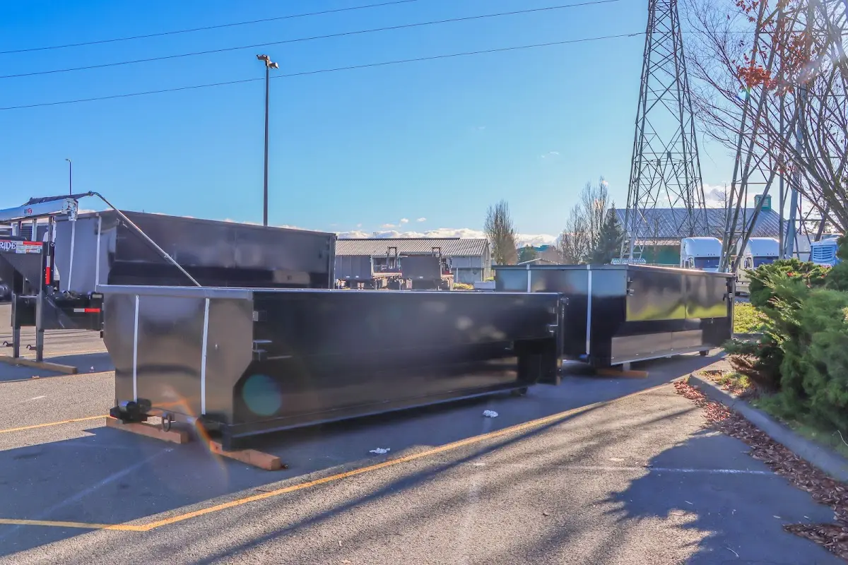 Roll-off dumpster ready for waste disposal at job site for 2 Yard Dumpster Rental in Eden